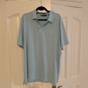 Travis Mathew blue shirt